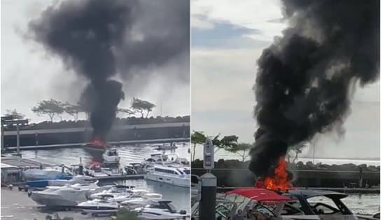 Imagem de Vídeo: lancha pega fogo em Marina e coluna de fumaça surpreende 