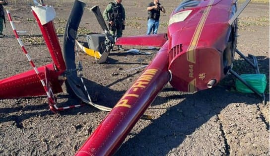 Imagem de Com quase 300 kg de cocaína, helicóptero cai e tripulação some; aeronave está em nome de policial civil